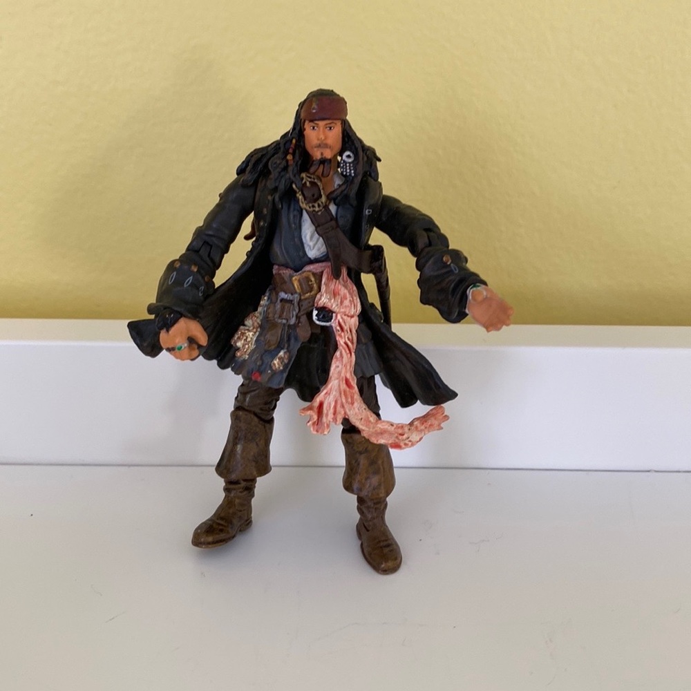 DISNEY ZIZZLE PIRATES OF THE CARIBBEAN JACK SPARROW 4” jointed action figure